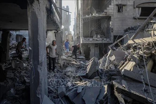 Tòa nhà bị phá hủy sau cuộc không kích của Israel tại Gaza. Ảnh: THX/TTXVN Tòa nhà bị phá hủy sau cuộc không kích của Israel tại Gaza. Ảnh: THX/TTXVN
