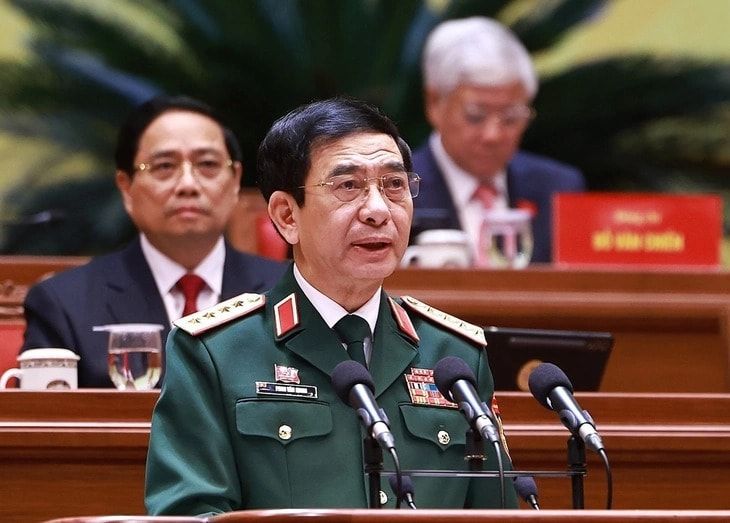 Đại tướng Phan Văn Giang, Ủy viên Bộ Chính trị, Phó bí thư Quân ủy Trung ương, Bộ trưởng Bộ Quốc phòng trình bày tham luận tại Đại hội. Ảnh: TTXVN