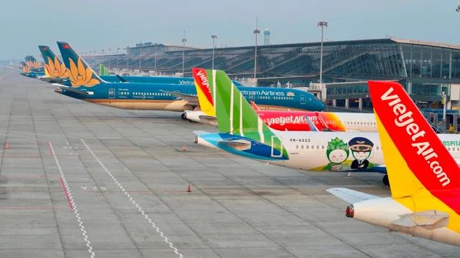 Máy bay của các hãng hàng không Việt Nam tại Sân bay Quốc tế Nội Bài. (Ảnh: PV/Vietnam+)