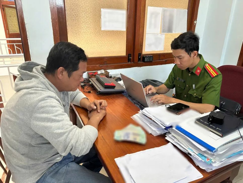 Trần Trung Toán tại cơ quan công an. Ảnh: CACC