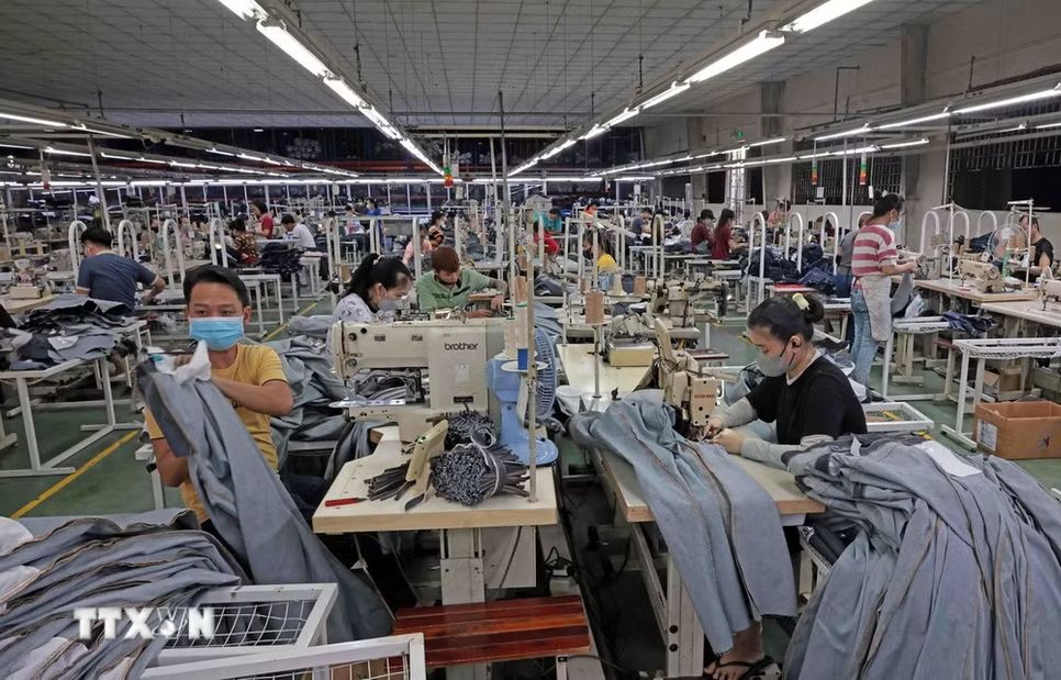 Công ty TNHH Việt Thắng JEAN mỗi năm xuất khẩu hàng triệu sản phẩm sang thị trường EU, Mỹ, Nhật Bản, Hàn Quốc. (Ảnh: Trần Việt/TTXVN)