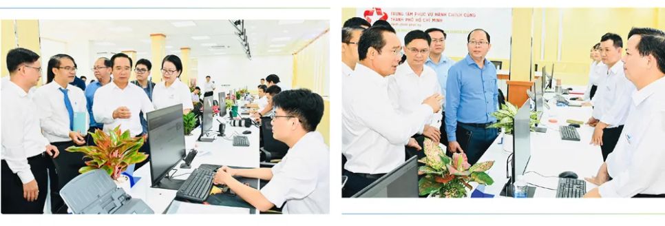 Chủ tịch UBND TPHCM Nguyễn Văn Được trao đổi cùng chuyên viên Trung tâm Phục vụ hành chính công TPHCM. Ảnh: VIỆT DŨNG