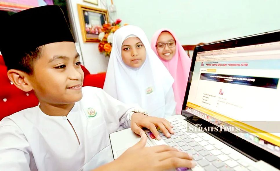 Học sinh Malaysia sử dụng Internet cho học tập. Ảnh: THE STRAIT TIMES Học sinh Malaysia sử dụng Internet cho học tập. Ảnh: THE STRAIT TIMES