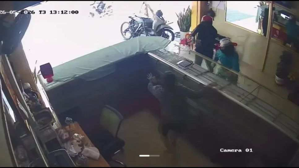 Hiện trường vụ cướp. Hình ảnh cắt từ camera của tiệm vàng Hiện trường vụ cướp. Hình ảnh cắt từ camera của tiệm vàng