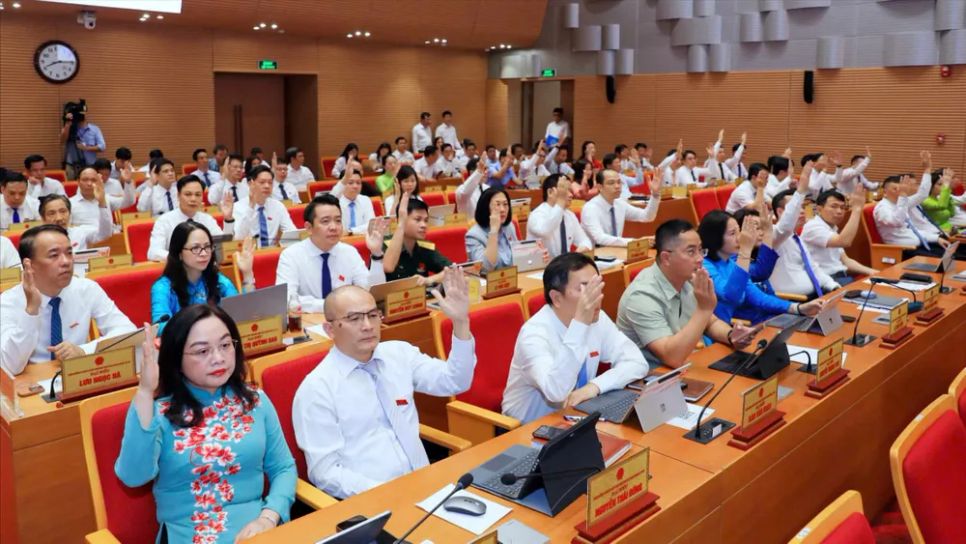 Các đại biểu HĐND TP Hà Nội khóa XVII tham dự Kỳ họp thứ ba. Ảnh: BẢO CHI