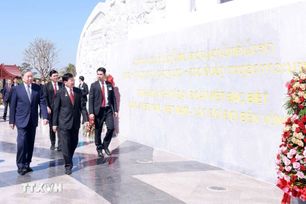 Tổng B&#237; thư T&#244; L&#226;m dự lễ kh&#225;nh th&#224;nh C&#244;ng vi&#234;n Hữu nghị L&#224;o - Việt Nam