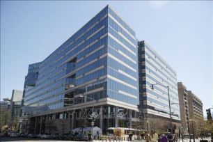 IMF điều chỉnh dự báo kinh tế thế giới