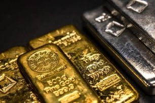 Vàng lấy lại mốc 5.100 USD, bạc hồi phục nhờ tiền bắt đáy